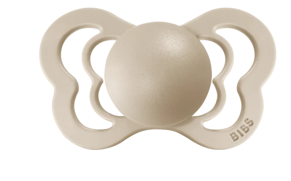 Bibs Vanilla Couture pacifier set. This nipple shape gives the least pressure on jaw, gums and teeth and comes in both soft natural rubber latex and silicone. It is recommended for children from 0-36 months. The shape of the lightweight shield leaves the nose free and facilitates easy breathing. All in a cute butterfly design. Ships to United States Duty Free.