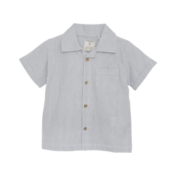Huttelihut Button down boys shirt. Great for Polo inspired, tennis club look.Let your child make a statement in fashion while enjoying precious moments with mom. With its timeless design and impeccable quality, the Huttelihut Button Down Woven Shirt is a must-have addition to any young trendsetter's wardrobe.  free shipping to Canada and the US on orders over $100, with standard shipping rates of $6 CAD / $4.30 USD for orders below. Plus, rest assured, duties into the US are included. 