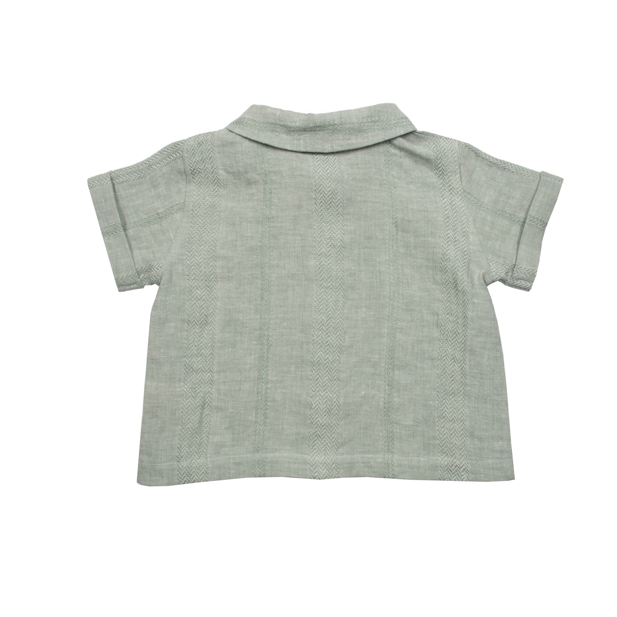 Textured Green Mint Linen polo top and shorts for baby. Gender Neutral outfit for baby for wedding.. made in portugal. Suuky Porto certified products. Beautiful for a garden wedding. Baby inspired outfit for holiday in Florida, Boca Raton. Ships to Canada and United States of America, Duty Free. Organic, natural Materials. First Birthday Gift for baby girl. Sustainable luxury for baby & toddler.